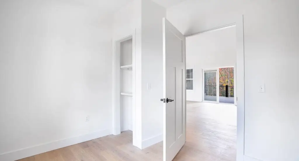 new construction bedroom with hardwood floors modern farmhouse