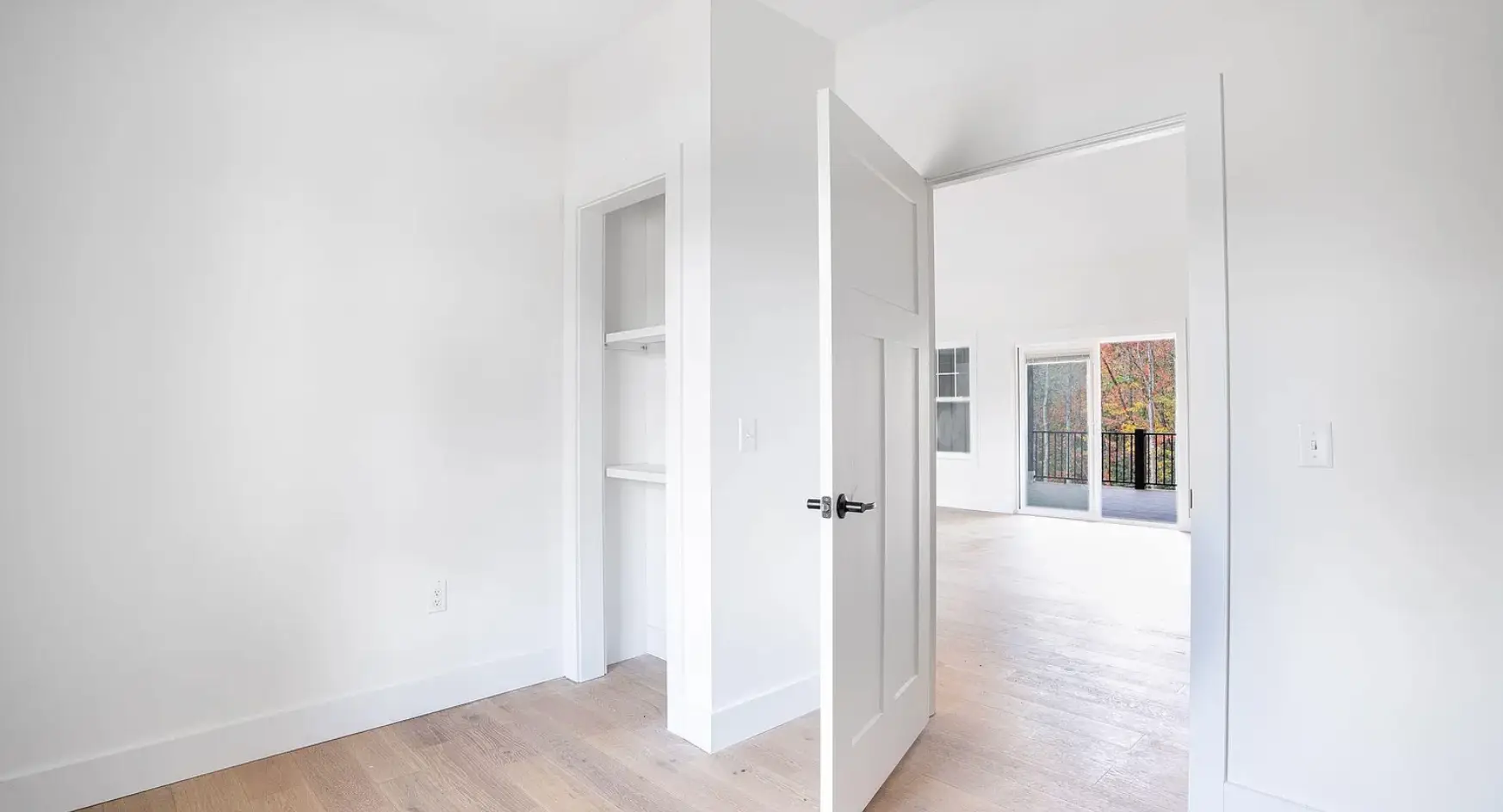 new construction bedroom with hardwood floors modern farmhouse