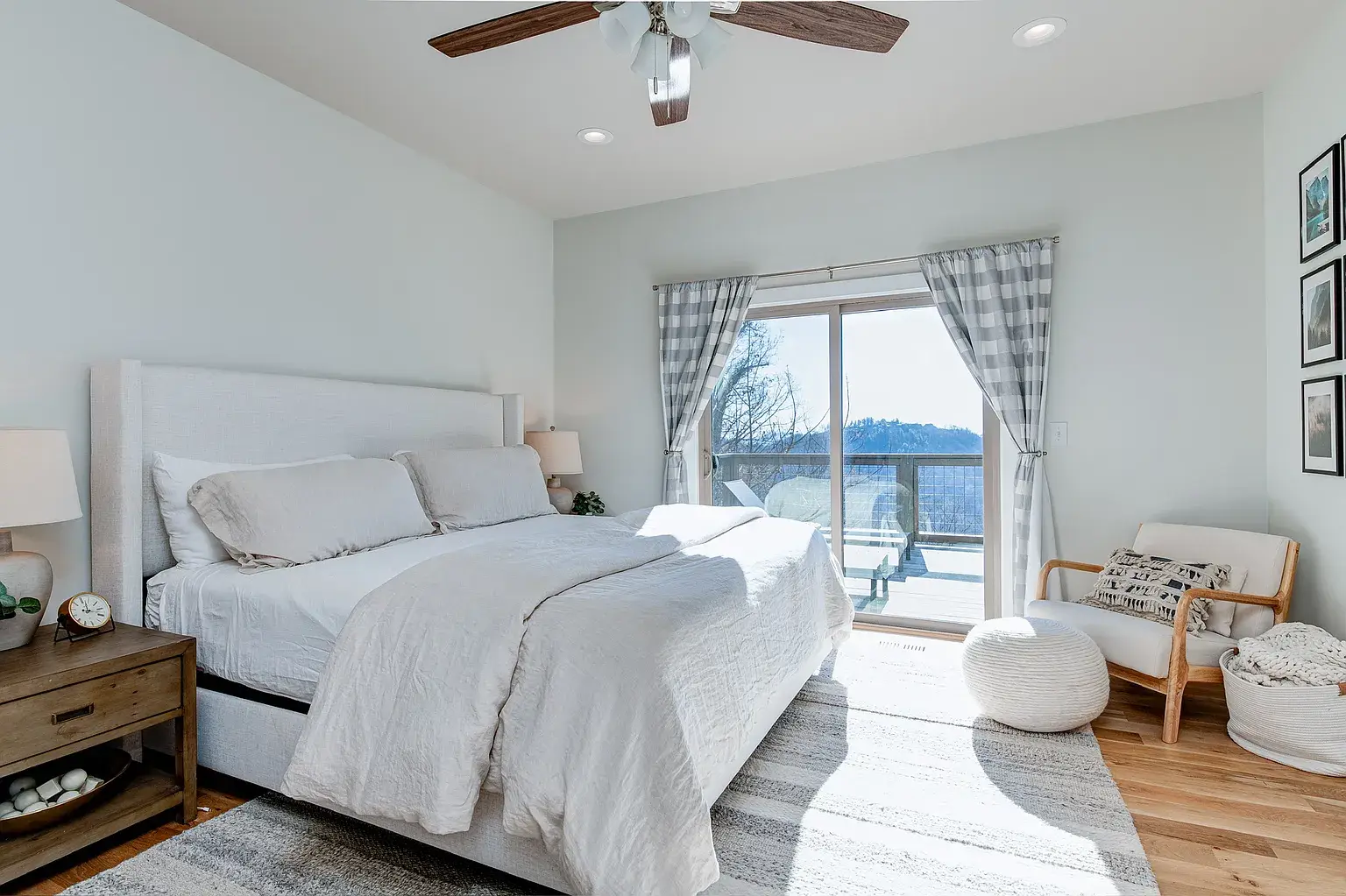 bedroom with large windows in Asheville mountain home