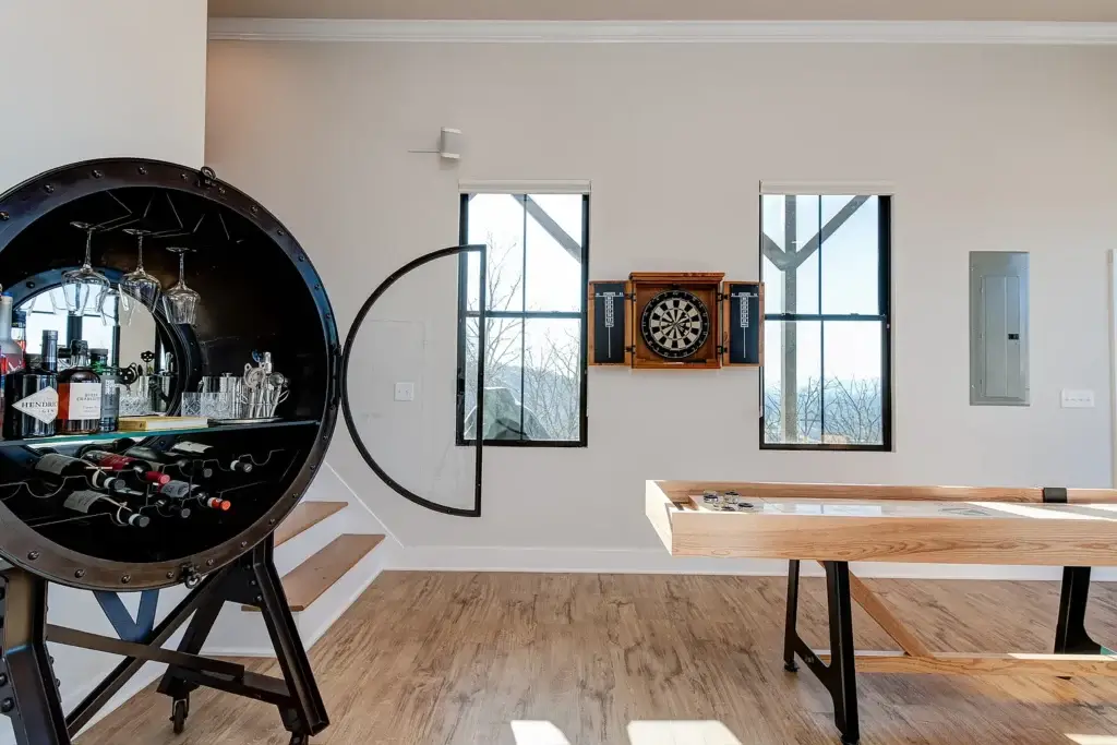 bedroom with large windows in Asheville mountain home
