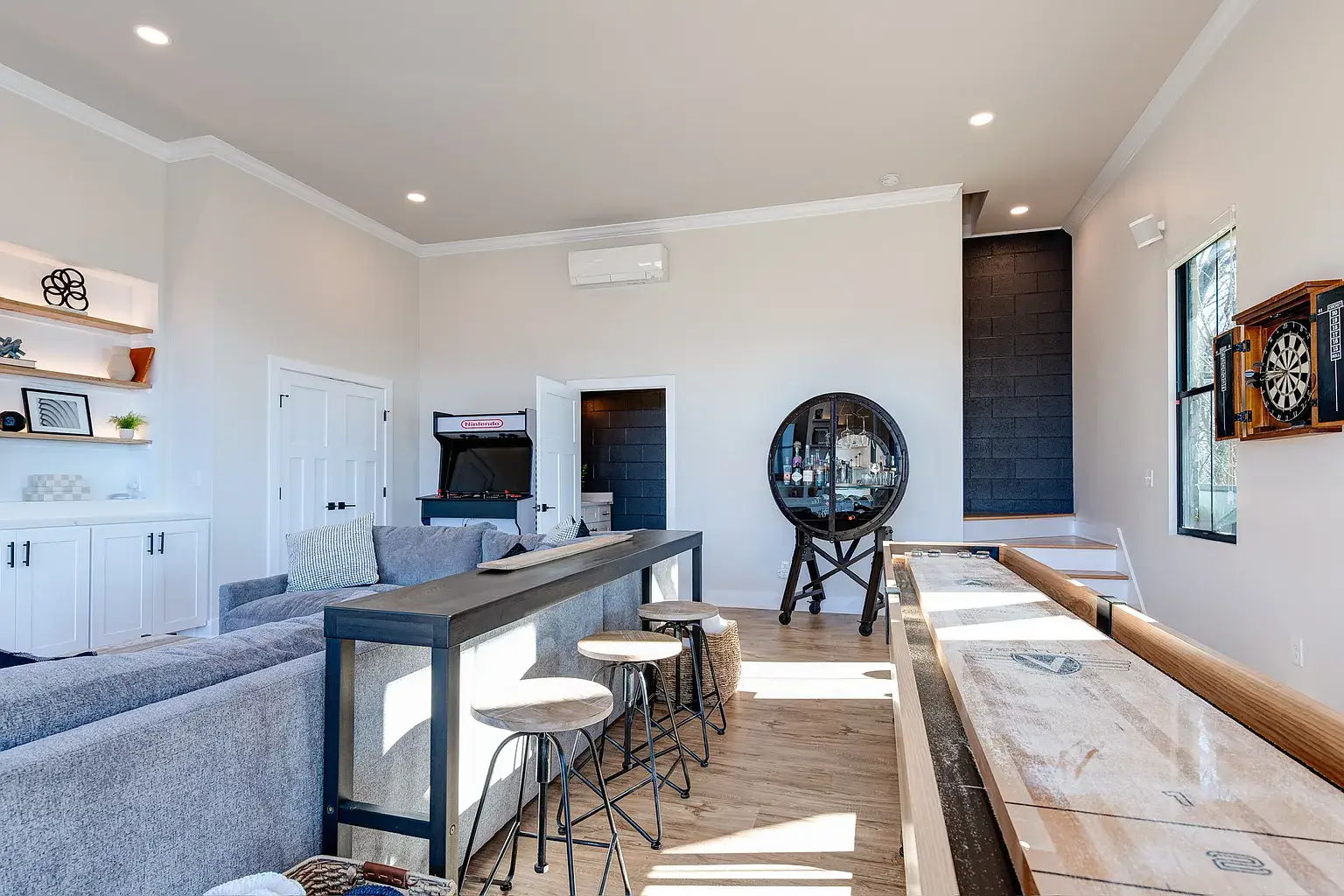 bedroom with large windows in Asheville mountain home