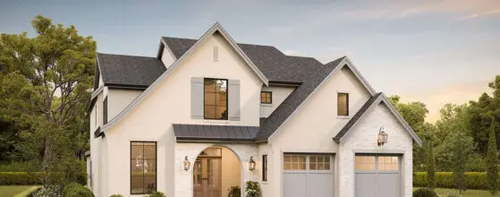 European-style home with white stucco exterior and elegant architectural details