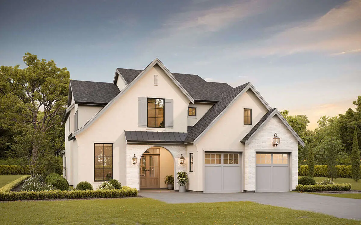 European-style home with white stucco exterior and elegant architectural details