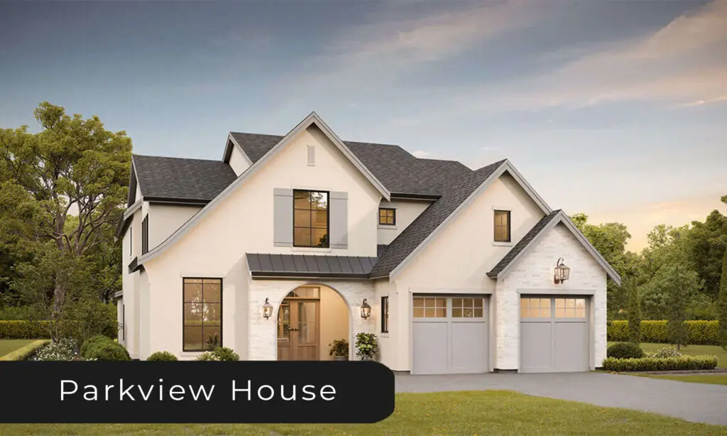 European-style home with white stucco exterior and elegant architectural details