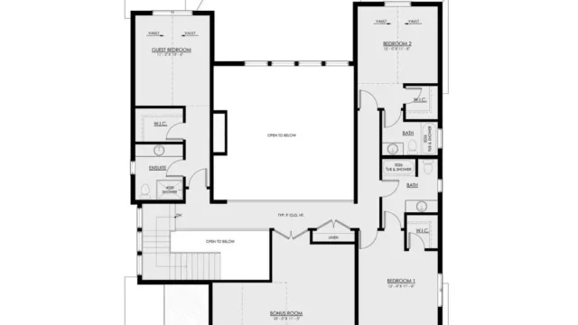 European-style home with white stucco exterior and elegant architectural details